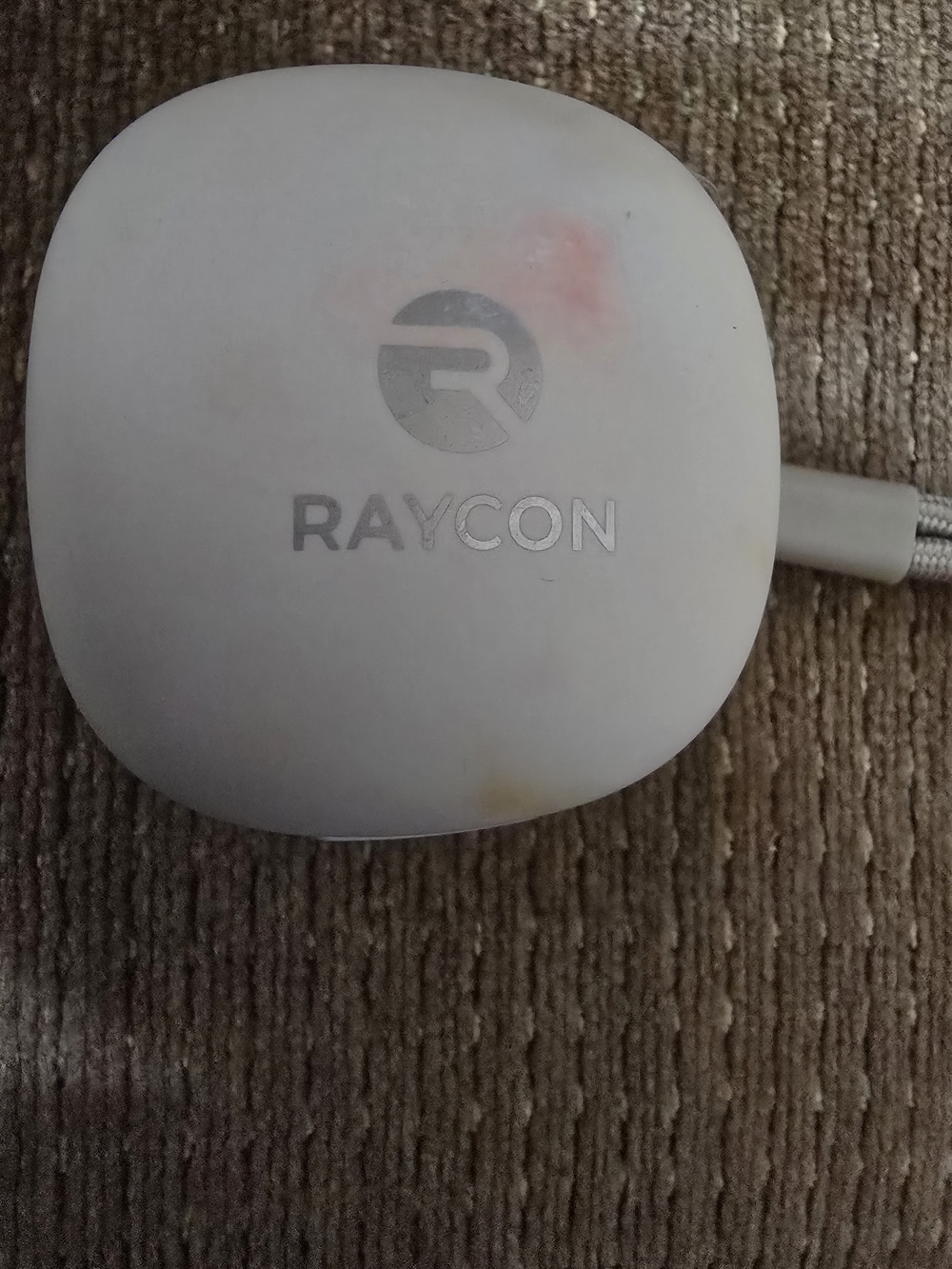 Raycon Fitness Earbuds With White Charging Case
